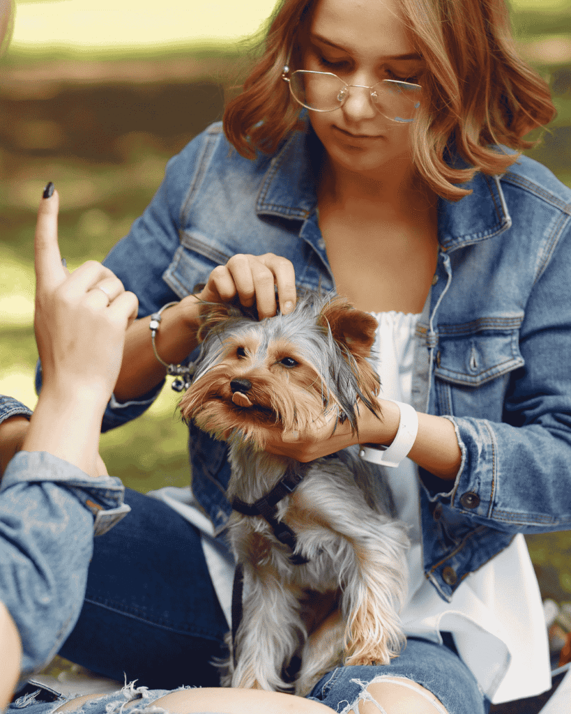 Happy pet with groomer at top-rated salon PawBasic in Mississauga